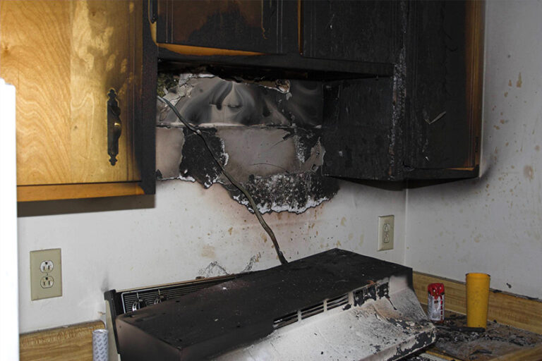a photo of fire damage in a local home kitchen oven and stove area in Clarksville, Tennessee