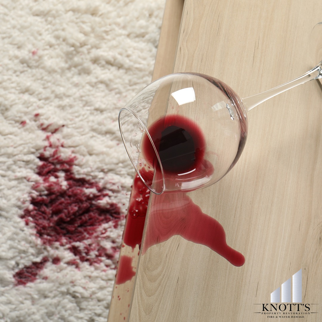 Knott's experienced team can clean even the toughest stains from carpets - such as the red wine spill on the white carpet flooring in this photo.