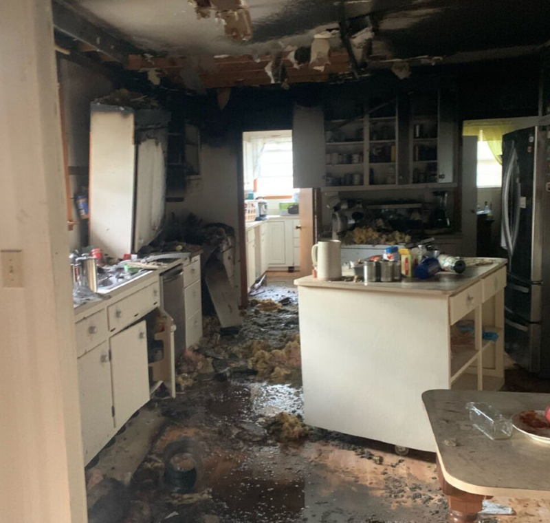 Knott's Property Restoration Service Fire Damage - A photo of a kitchen home interior in Cheatham area completely ruined by fire.